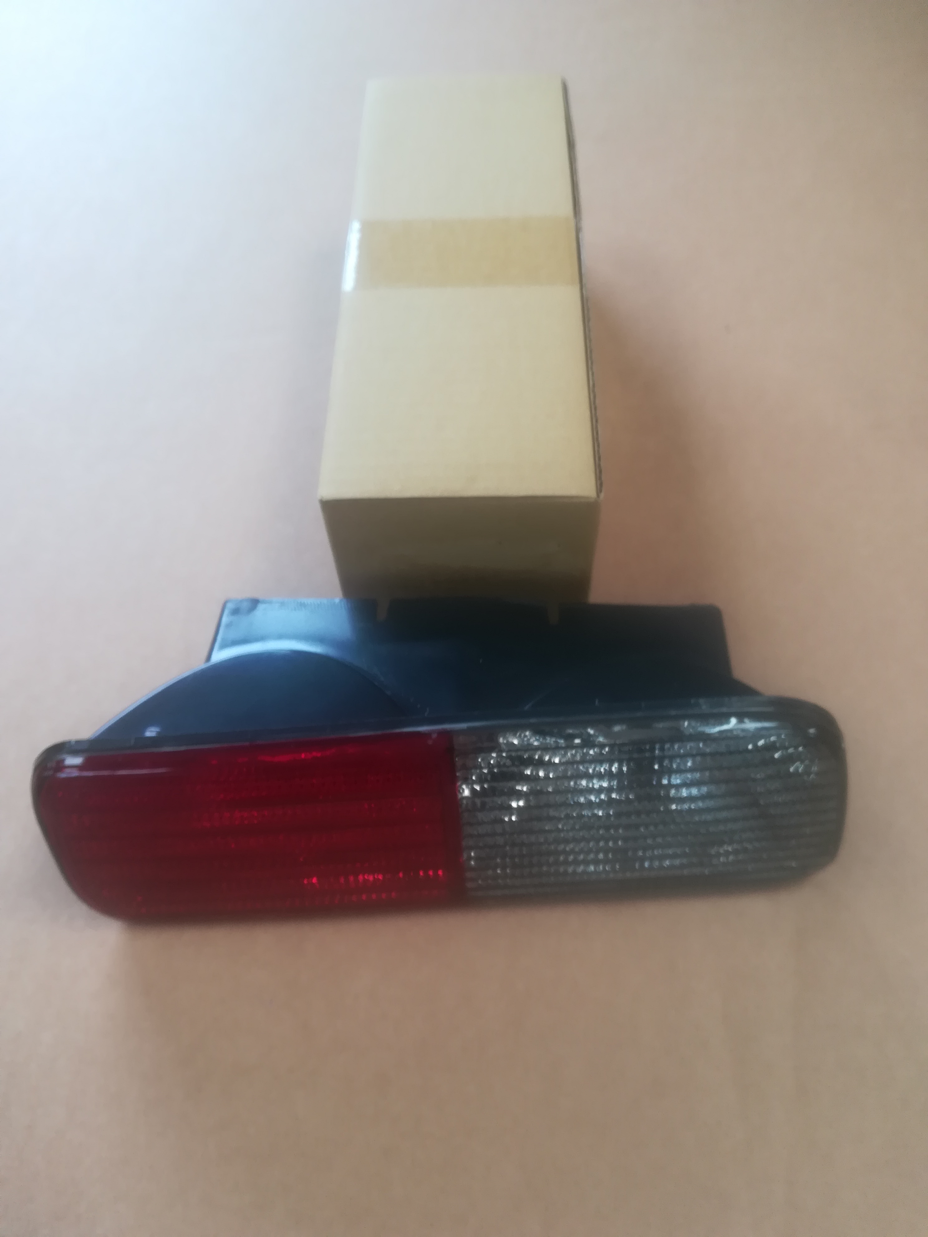 Product image: LAND ROVER DISCOVERY 2 REAR L/H BUMPER LAMP RED / CLEAR